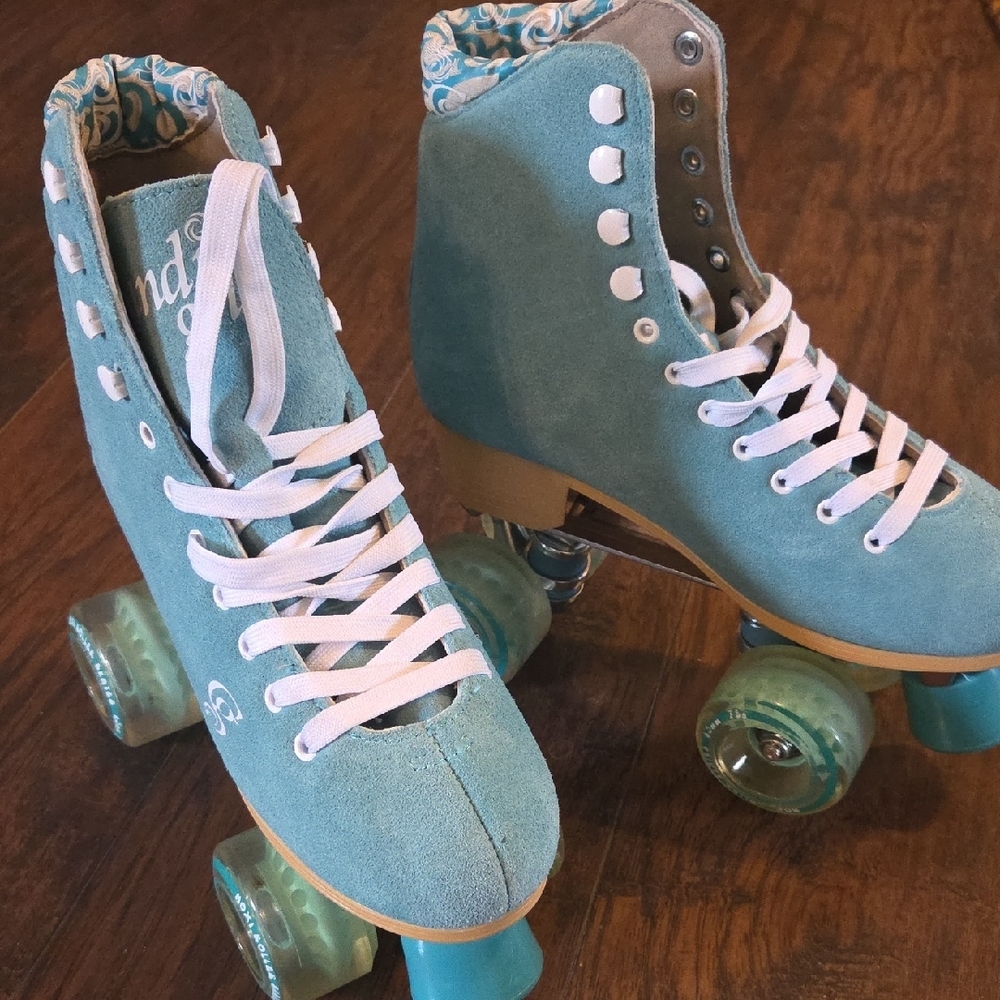 Blue Roller Skates with White Laces